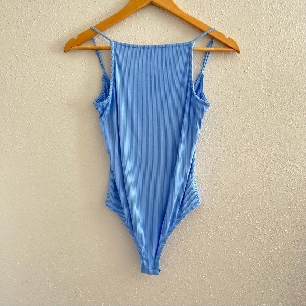 A Loves A Blue Bodysuit